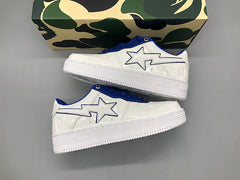 A Bathing APE white & navy patent leather sneakers