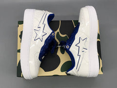 A Bathing APE white & navy patent leather sneakers